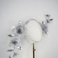 Dewdrops on Roses - Couture wraparound headpiece of sculptural silver roses sparkling with crystal dewdrops.