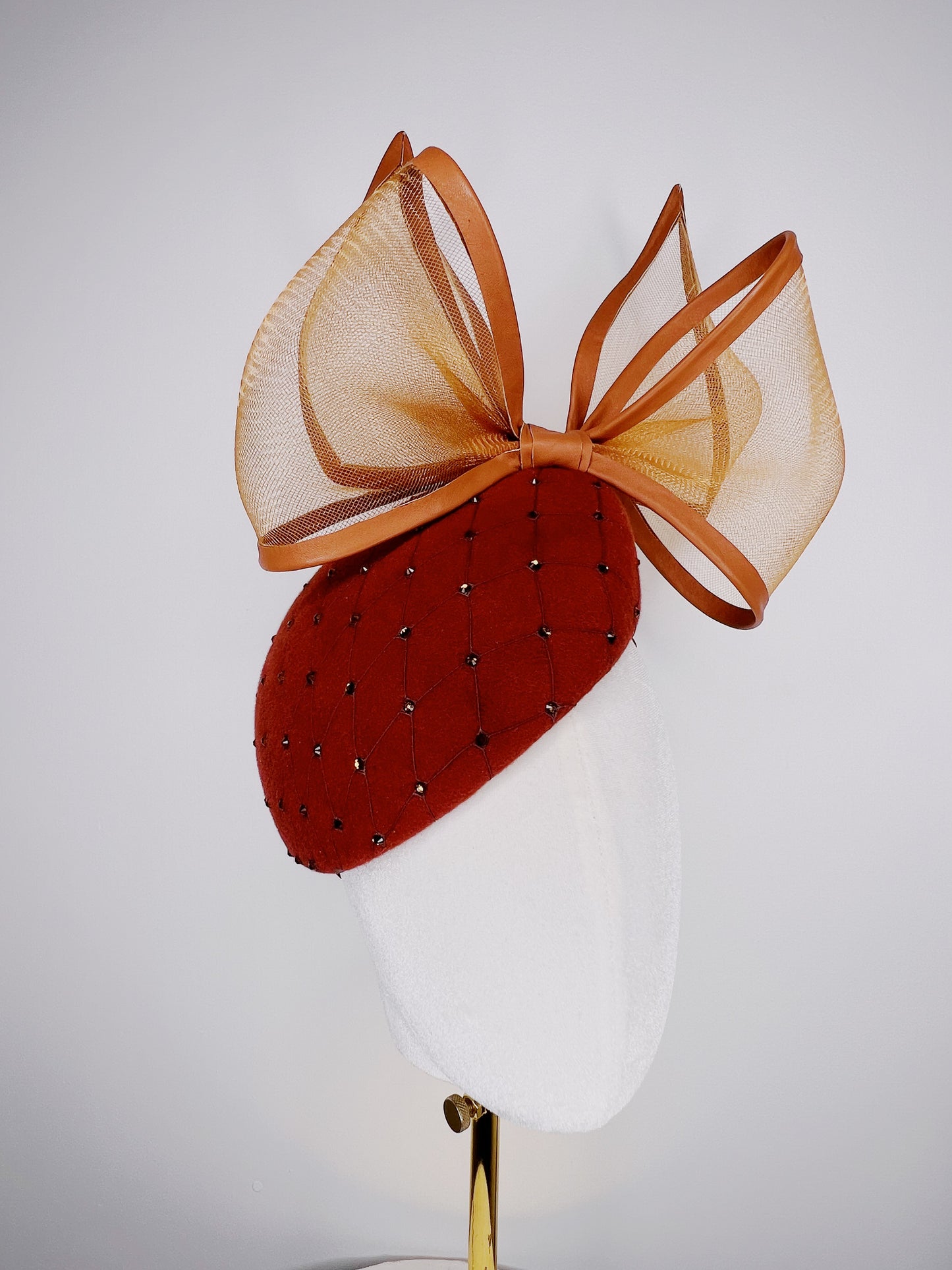 Coco Delight - Brown fur felt face hugger with dramatic crinoline bow and crystal veil detail.