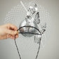 Taking Flight - Silver leather veiled percher with crystoform butterflies