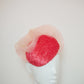 Pink Coral - Vintage raffia watermelon pink straw with pink and peach ruffle crinoline detail on a face hugger base.