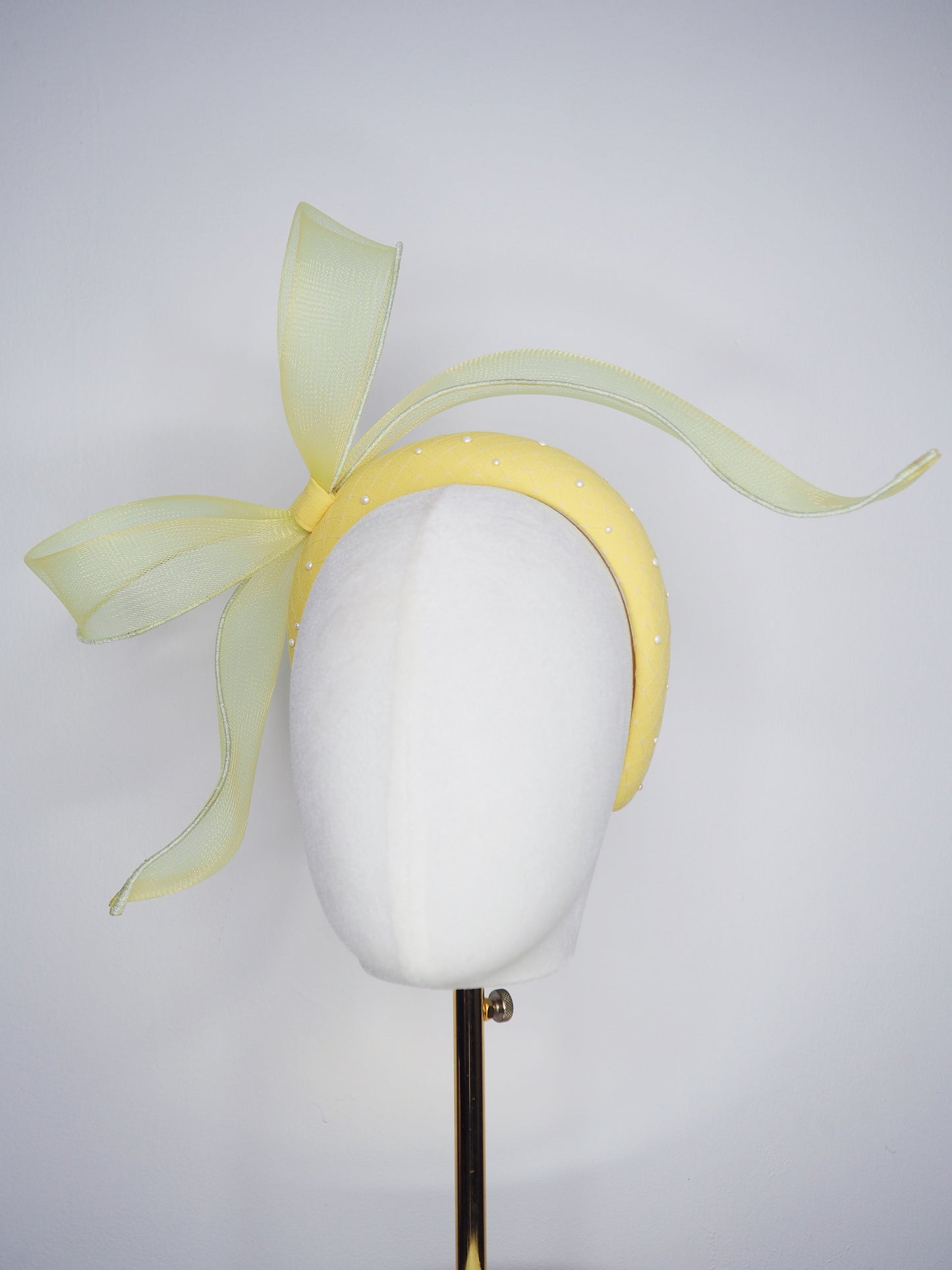Soleil - A joyful lemon bow headpiece with pearl encrusted veil detail