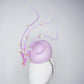 Blossoms in Flight - 	Pastel lilac pork pie pillbox with floating quills and iridescent cherry blossom detail