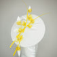Snow buttercup - White raffia disc with golden yellow crystoform buttercups