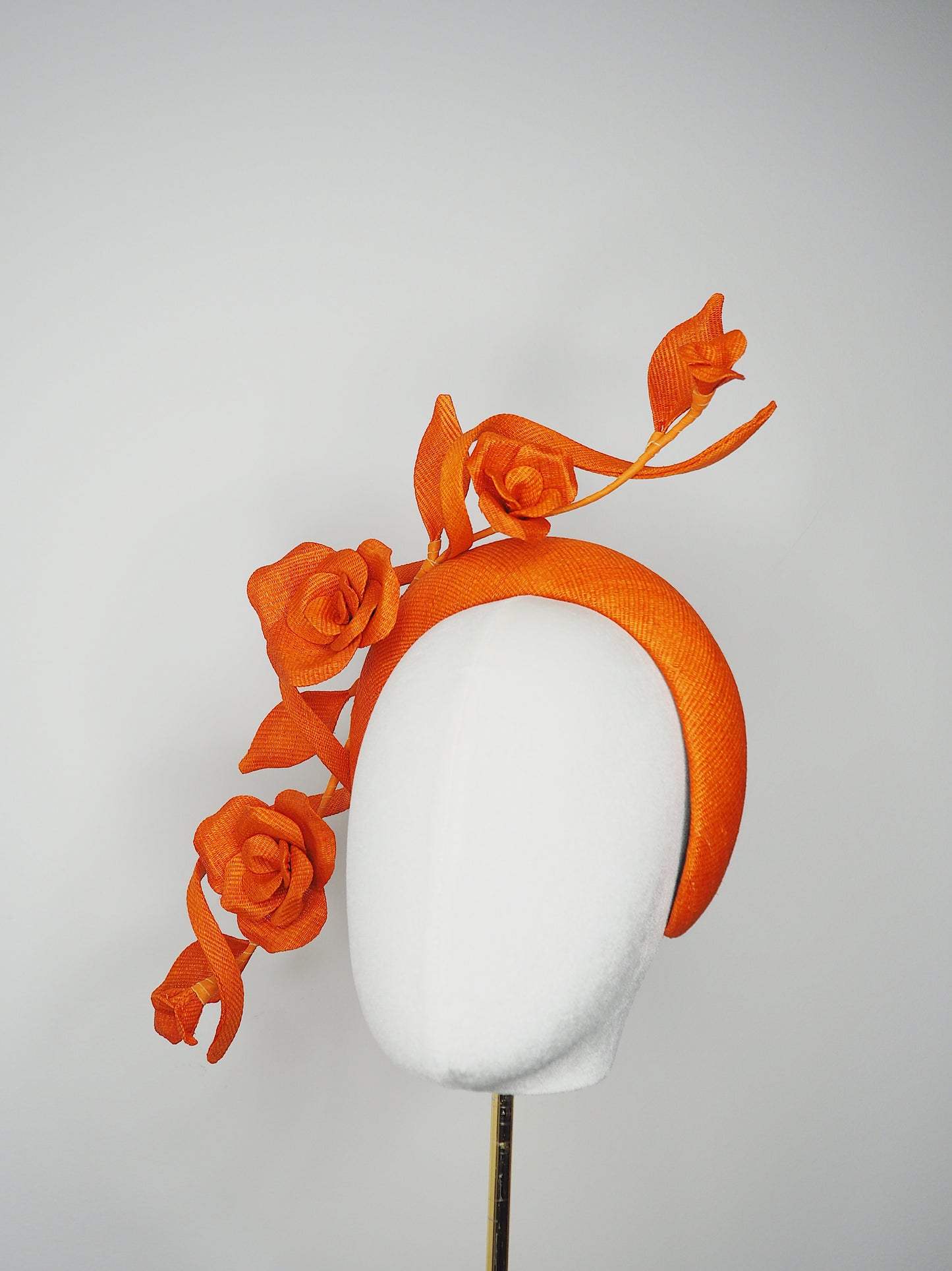 Tangerine Bloom - Orange 3D headband in Tinalak straw with sculptural orange swirl and hand-sculpted orange straw roses and buds