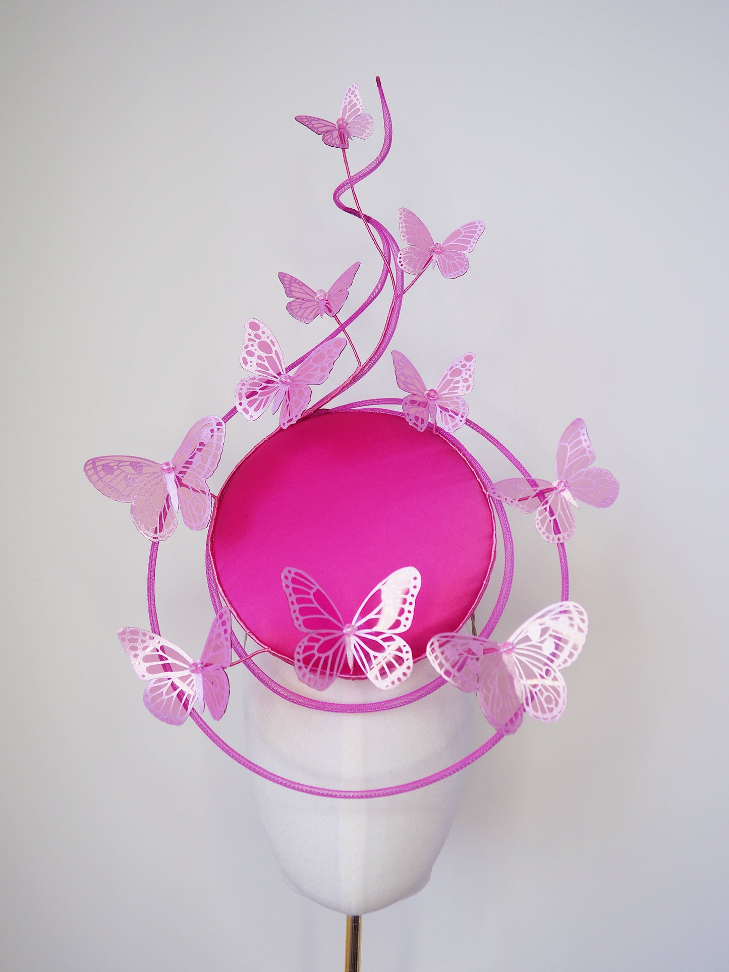 Butterfly Mirage Percher - Hot pink percher disc with tubular crinoline swirl peekaboo and cascading glitter butterflies