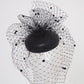 Under the veil - Full face spotty veil on leather button base