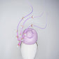 Blossoms in Flight - 	Pastel lilac pork pie pillbox with floating quills and iridescent cherry blossom detail
