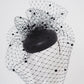 Under the veil - Full face spotty veil on leather button base