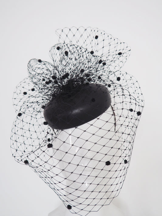 Under the veil - Full face spotty veil on leather button base