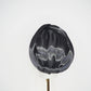 Glass Lake - A sculptural blocked turban crafted from luminous fabric inspired by morning reflections on water.