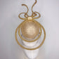 Midas Touch - Golden percher with wired bow and peekaboo detail