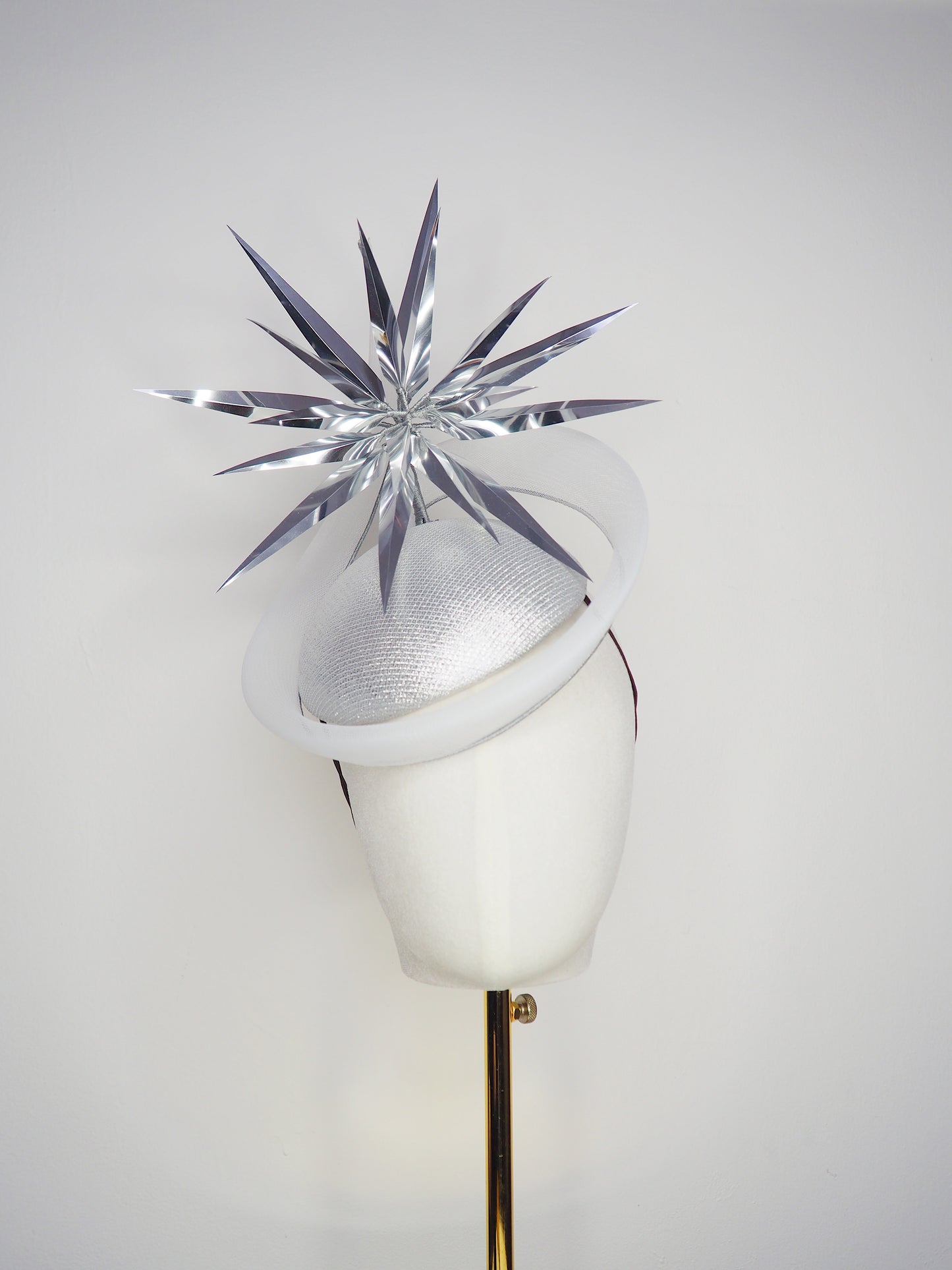 Silver Rays - Silver crinoline swirl and lurex base with floating silver starburst