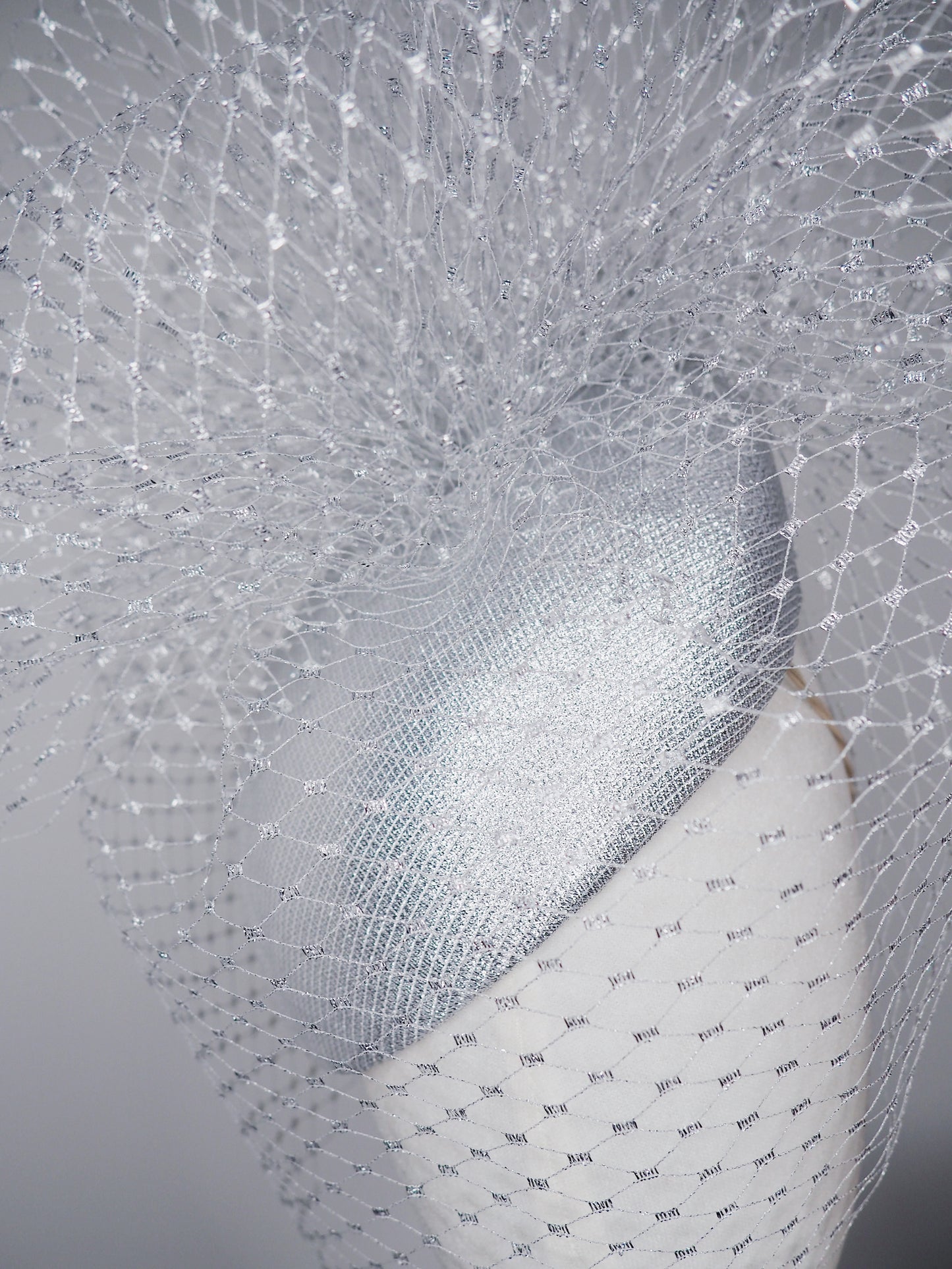 Silver Lining Clouds - Delicate silver lurex face-hugger