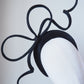 Blowing in the breeze - black parisissal Rope bow on satin and veil detail 3d headband