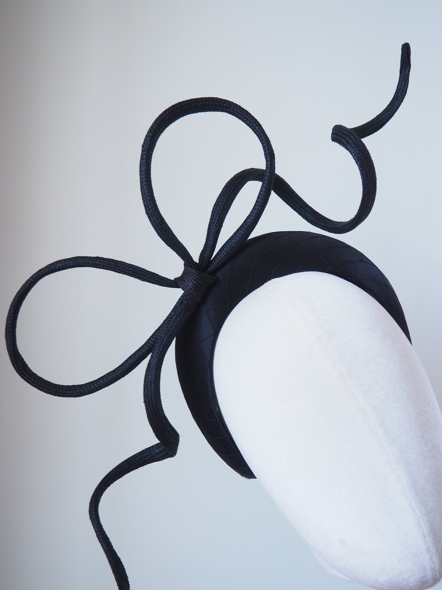 Blowing in the breeze - black parisissal Rope bow on satin and veil detail 3d headband