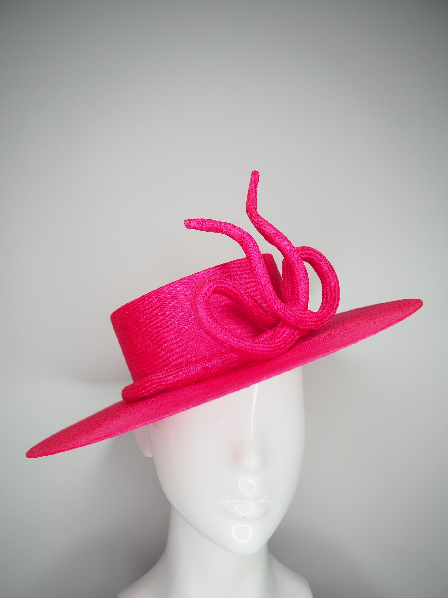 Bow on a boater  - Vivid pink parisissal Straw boater with a sculpted parisisal bow feature