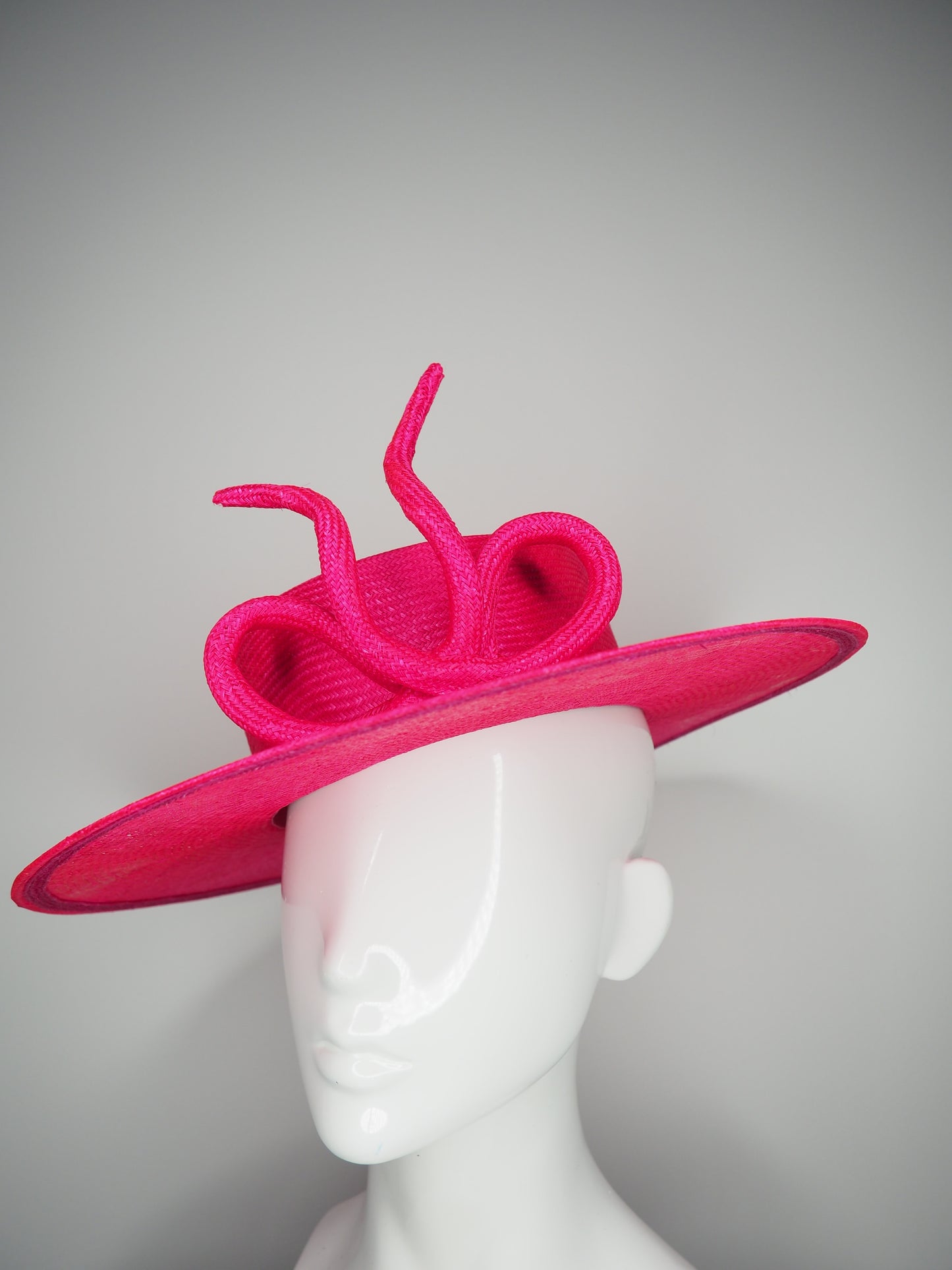 Bow on a boater  - Vivid pink parisissal Straw boater with a sculpted parisisal bow feature