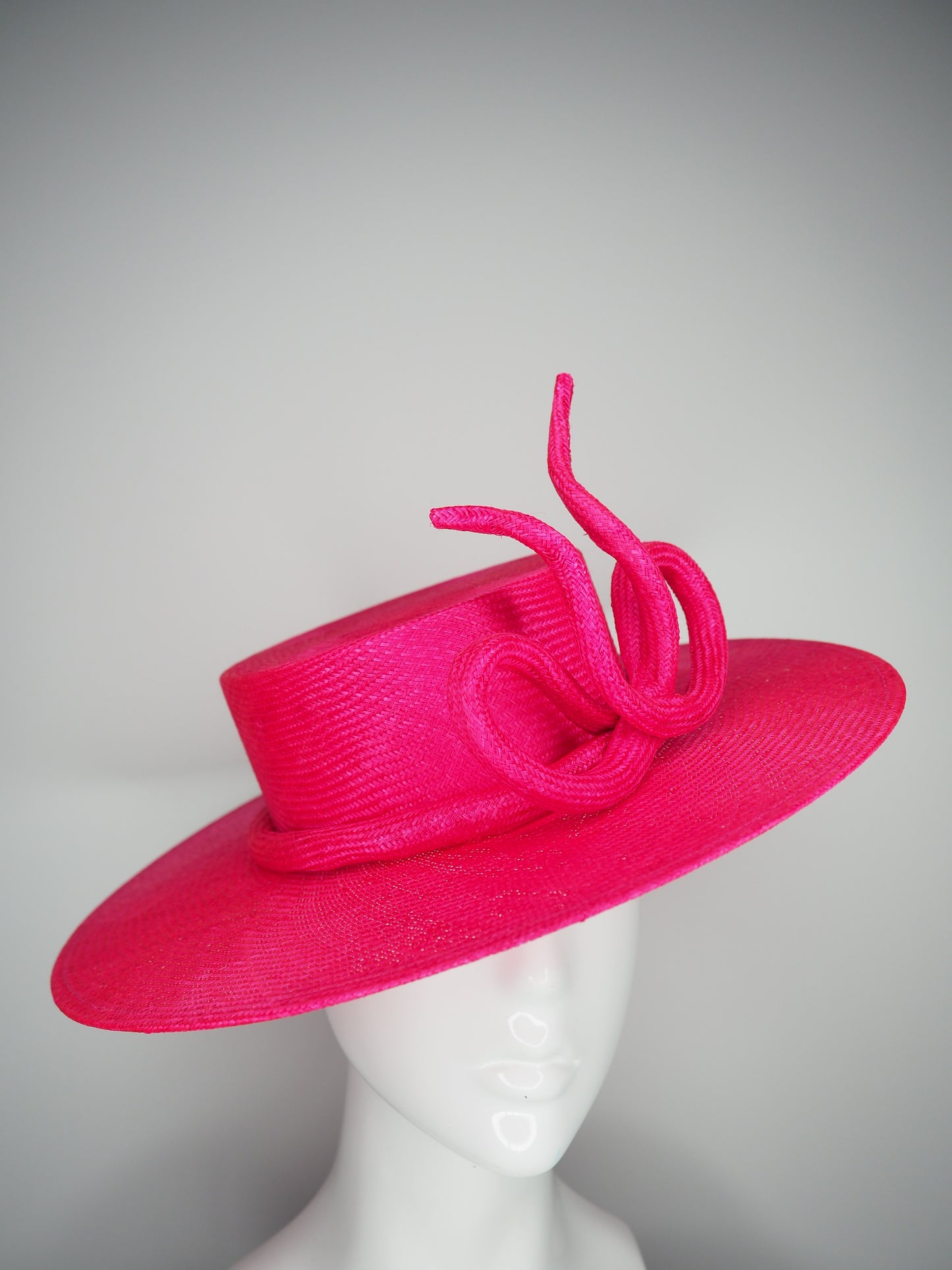 Bow on a boater  - Vivid pink parisissal Straw boater with a sculpted parisisal bow feature