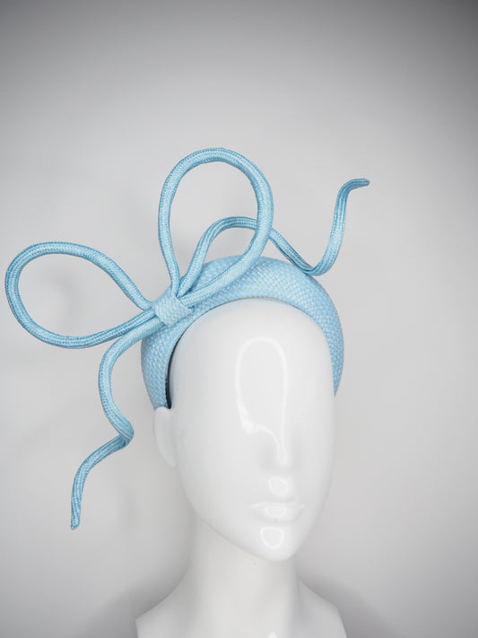 Blowing in the breeze - Baby Blue Straw Rope bow on raffia base