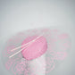 La Vie En Rose - Transparent Crystoform floral patterned brim on a pastel pink leather teardrop base.