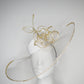 Golden Rose - Transparent peekaboo embellished brim withwhite leather crown and gold crystoform chain rose.