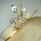 Golden Glimmer - Natural straw slanted brim boater with gold crystoform rose and crinoline trim.