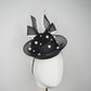 Back Tie pearl - Black asymmetric straw pillbox with wired crinoline bow in black and white and a scattering of pearls