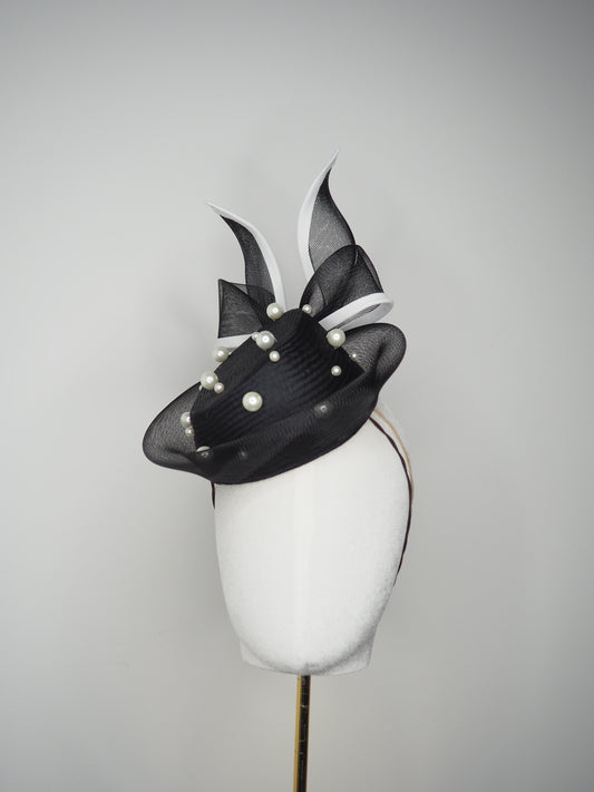 Back Tie pearl - Black asymmetric straw pillbox with wired crinoline bow in black and white and a scattering of pearls