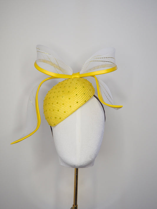 Sunshine - Yellow Petite Facehugger – yellow straw base covered in crystals, with white and gold crinoline bow edged in yellow leather