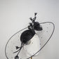 A Rainy Day in Melbourne - Black clear cristoform brim with wispy crinline roses  & crinoline swirl