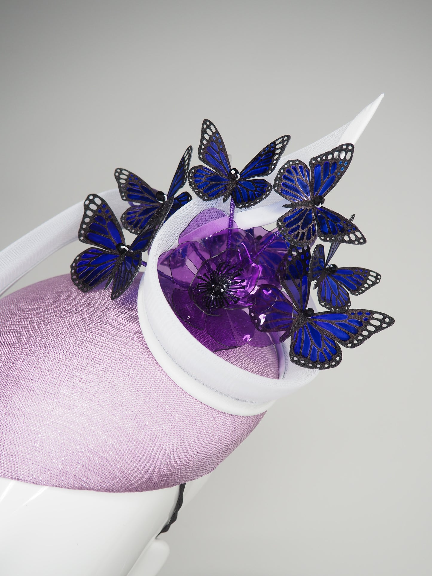 Butterfly Bloom - Hand painted indigo butterflies on a facehugger base with a purple crystoform bloom