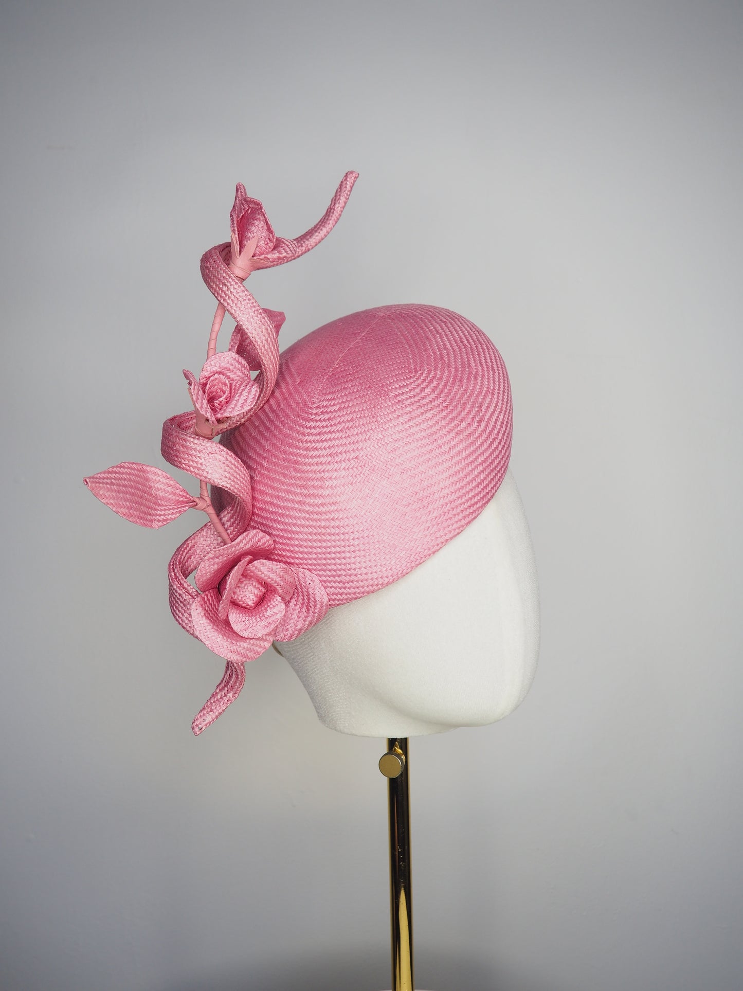 Rosetta - A playful candy pink face-hugger beret featuring sculptural straw swirls and handcrafted Parisissal roses.