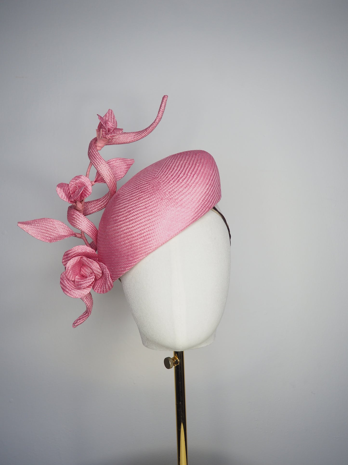 Rosetta - A playful candy pink face-hugger beret featuring sculptural straw swirls and handcrafted Parisissal roses.