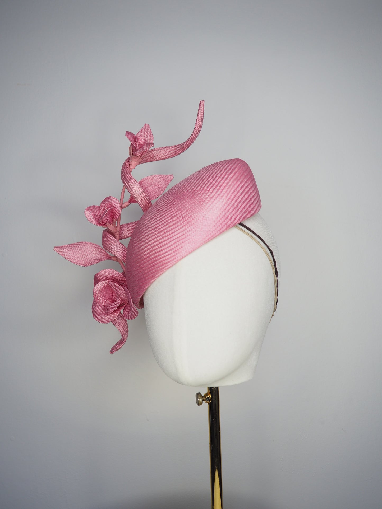 Rosetta - A playful candy pink face-hugger beret featuring sculptural straw swirls and handcrafted Parisissal roses.