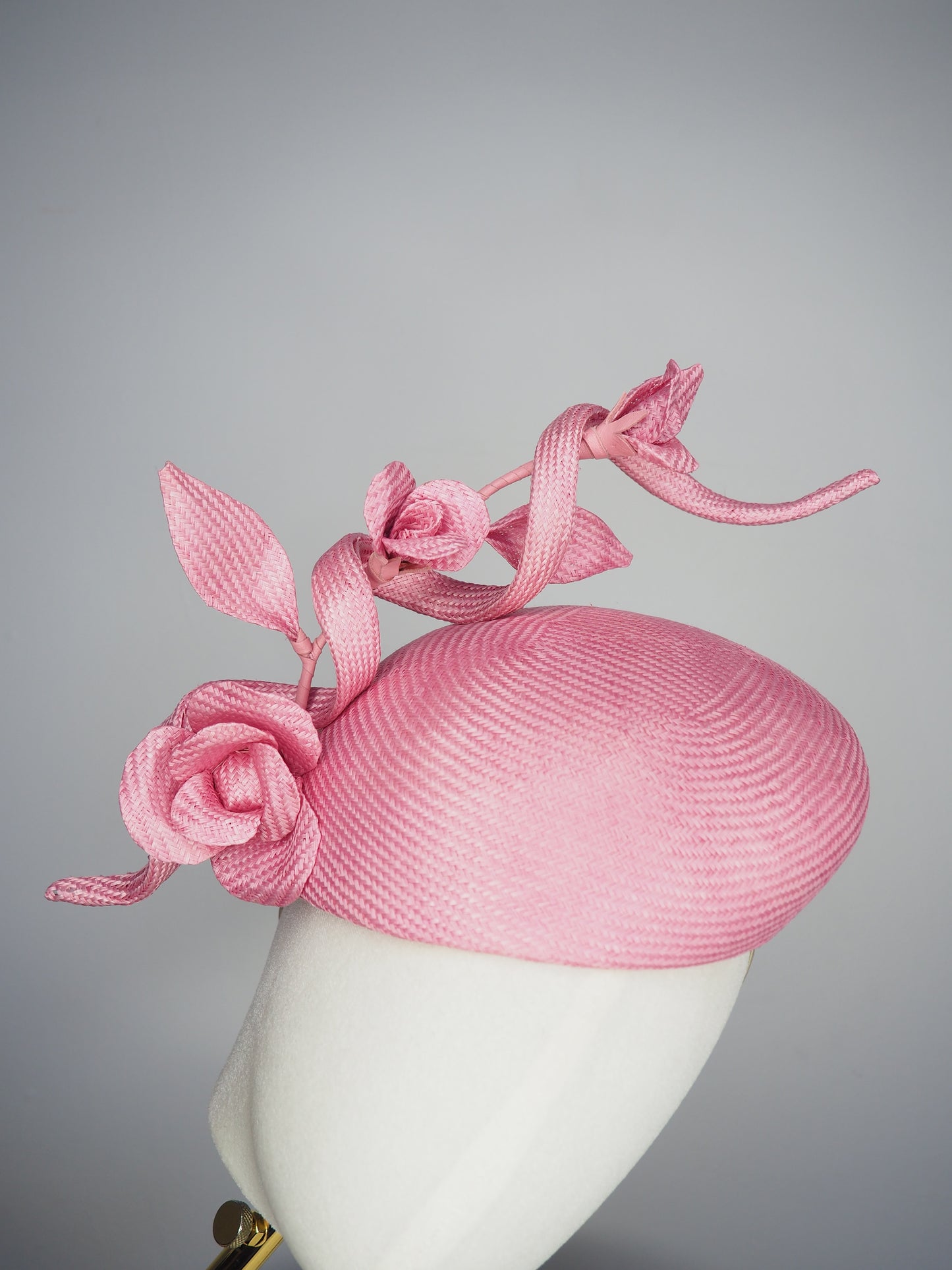 Rosetta - A playful candy pink face-hugger beret featuring sculptural straw swirls and handcrafted Parisissal roses.