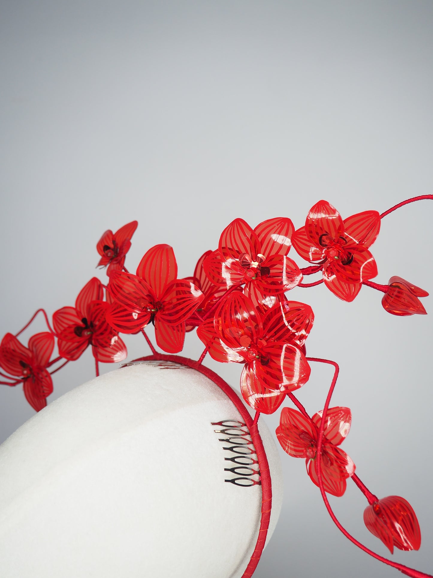 Scarlet Bloom -A dramatic floating orchid headband with sculptural wirework and handcrafted crimson blooms.
