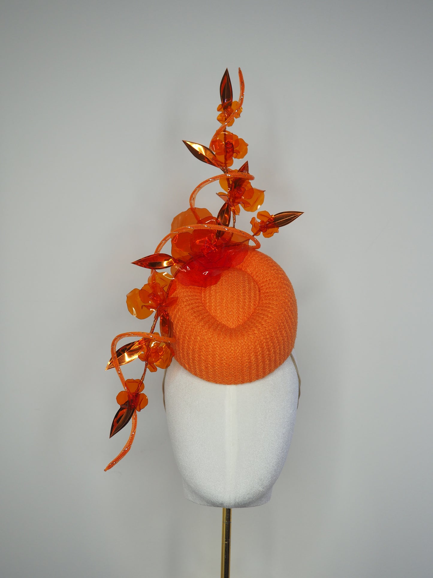 Clementine Twist - Orange pork pie pillbox with crystoform rose vine and tubular crinoline swirl