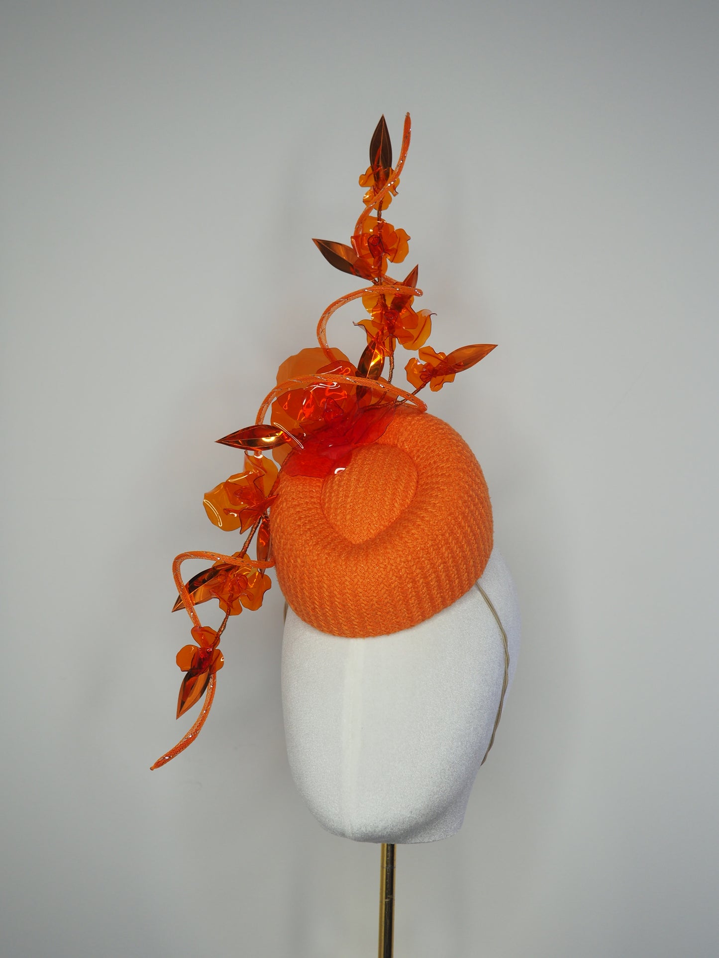 Clementine Twist - Orange pork pie pillbox with crystoform rose vine and tubular crinoline swirl