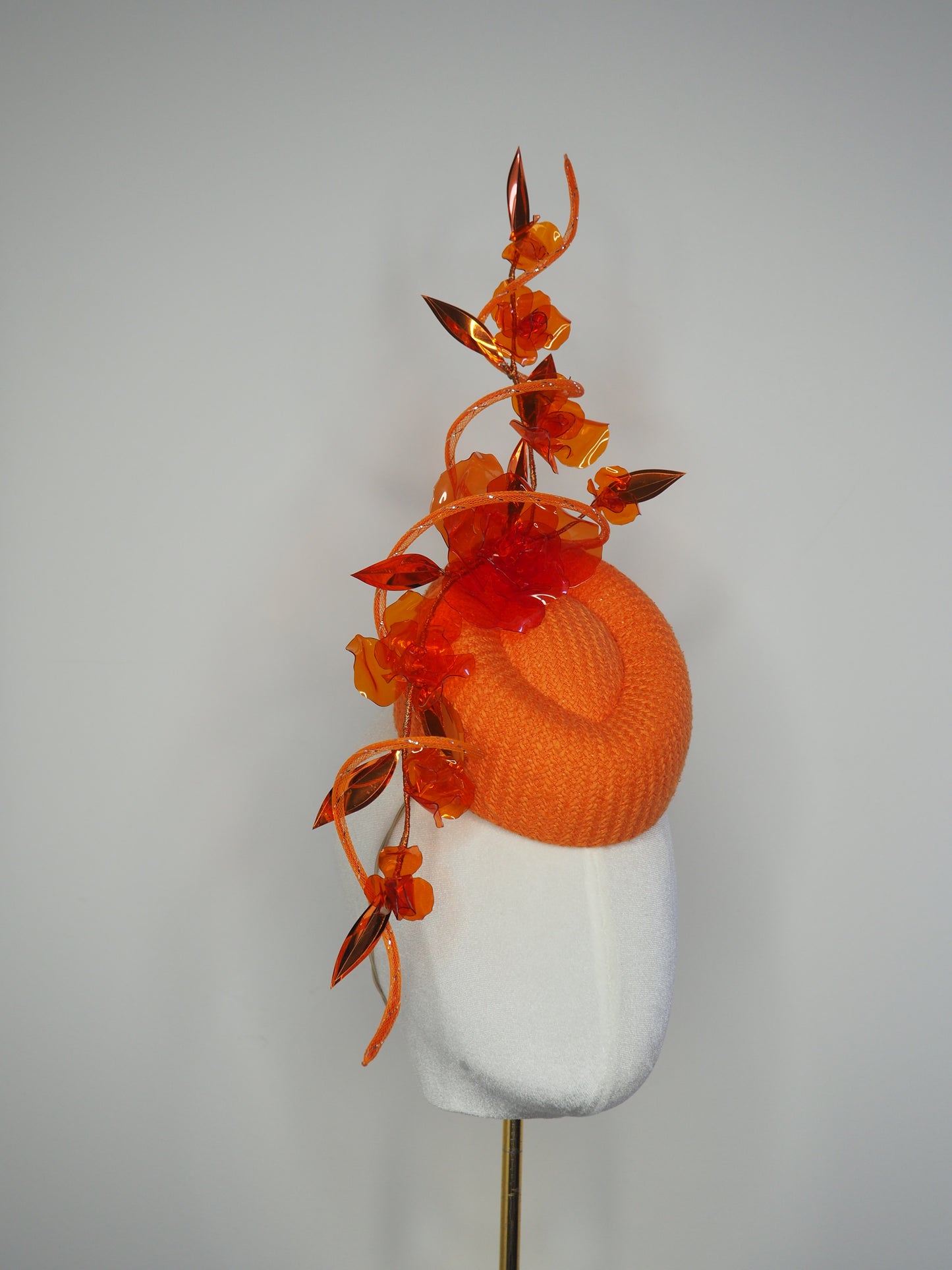Clementine Twist - Orange pork pie pillbox with crystoform rose vine and tubular crinoline swirl