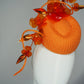 Clementine Twist - Orange pork pie pillbox with crystoform rose vine and tubular crinoline swirl