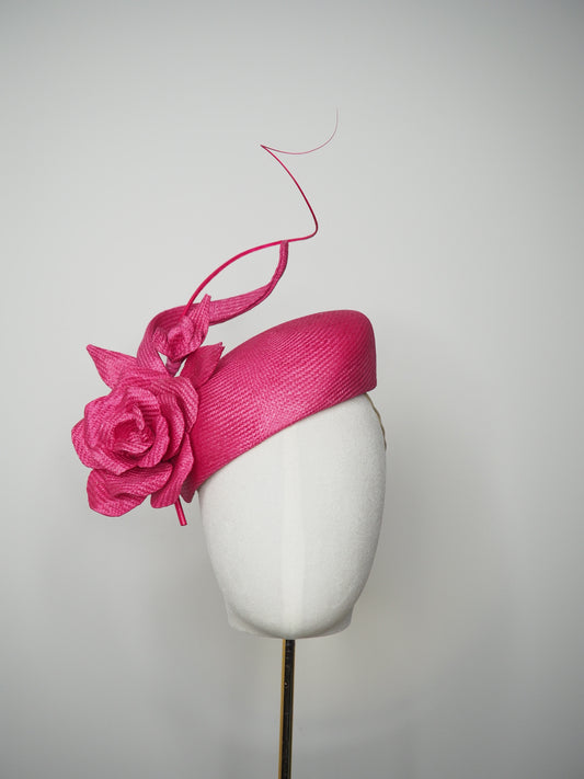 Rosé Reverie - Pink parasisal facehugger beret-style headpiece with sculpted straw rose and blossom and sculpted swirl