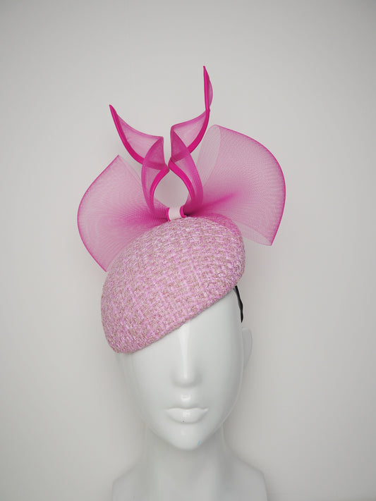 Bubblegum baby- Hot pink leather edged crinoline bow on a baby pink tweed face-hugger base.