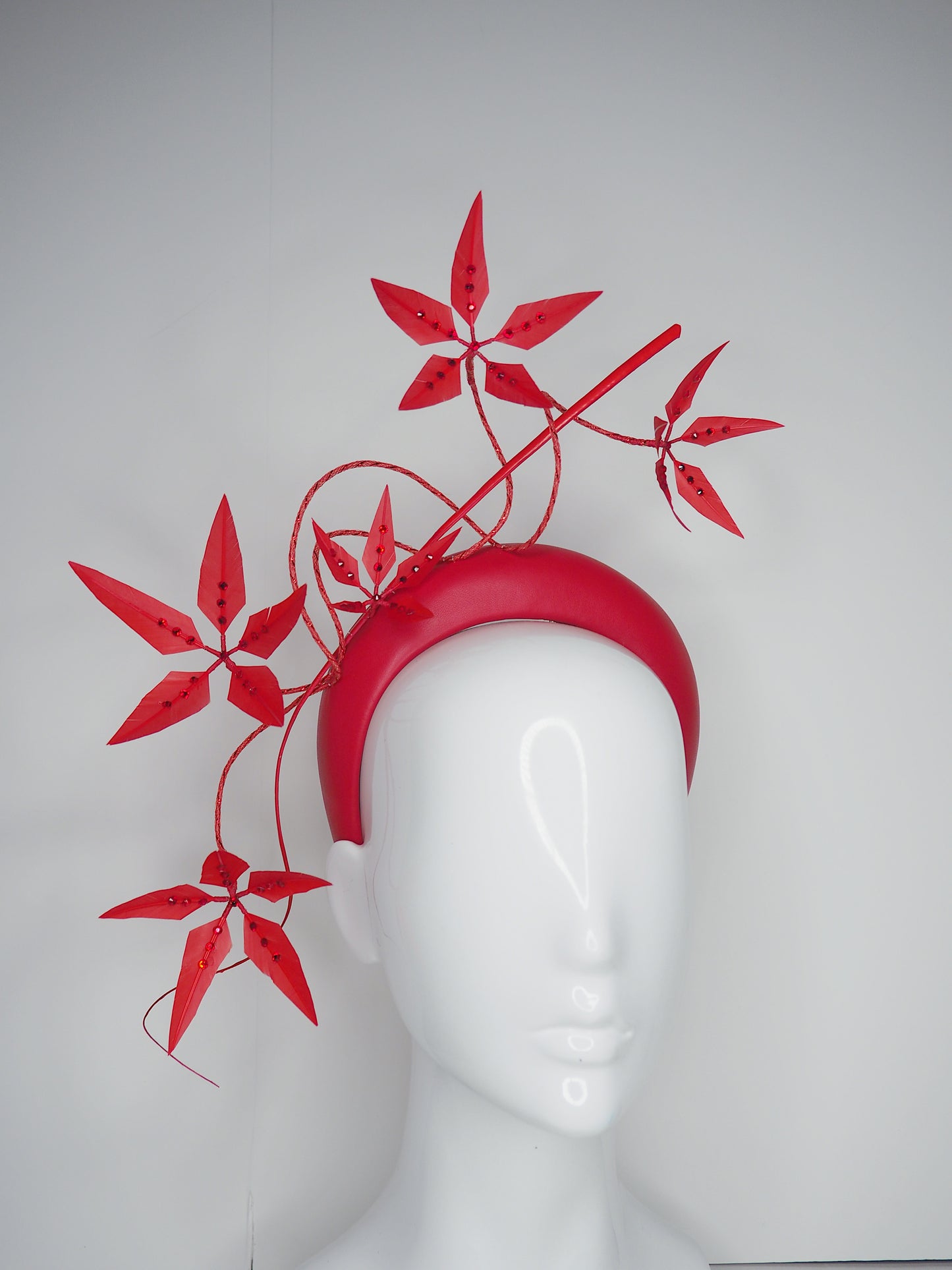 Razzamatazz - Red leather 3d headband with spiky Feather flowers and diamanté detail