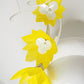 Pre-loved - You Are My Sunshine -Yellow Feather flower vine with ostrich quills on a white woven 3d headband