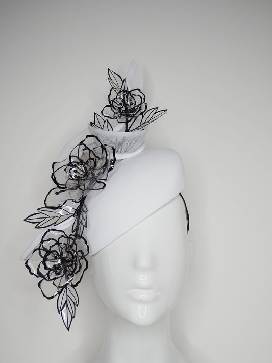 Translucent illusion - white leather face-hugger beret with crinoline swirl and flower detailing