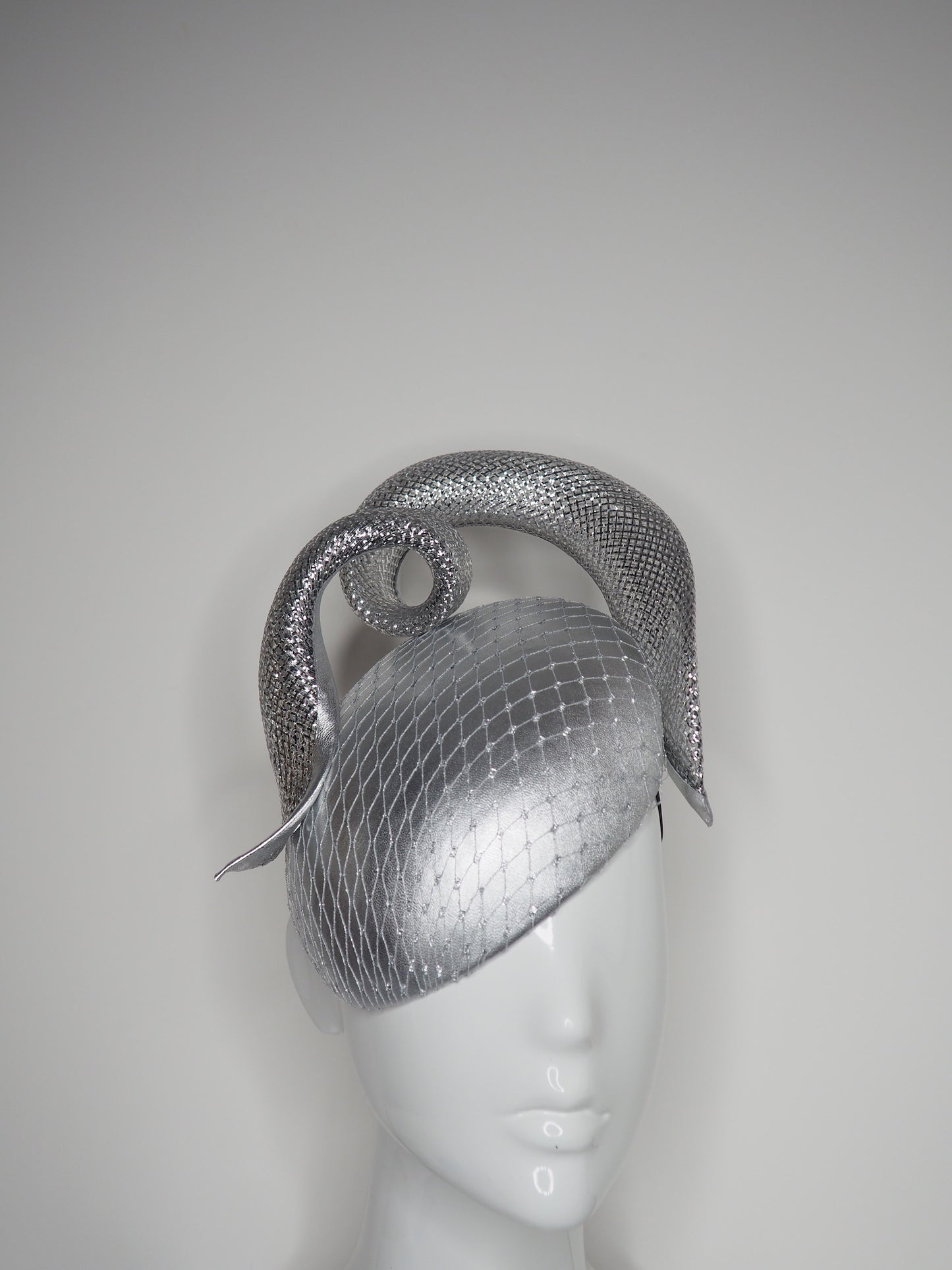 Silver siren - Silver leather facehugger beret with crinoline swirl and veiling detail
