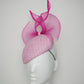 Bubblegum baby- Hot pink leather edged crinoline bow on a baby pink tweed face-hugger base.