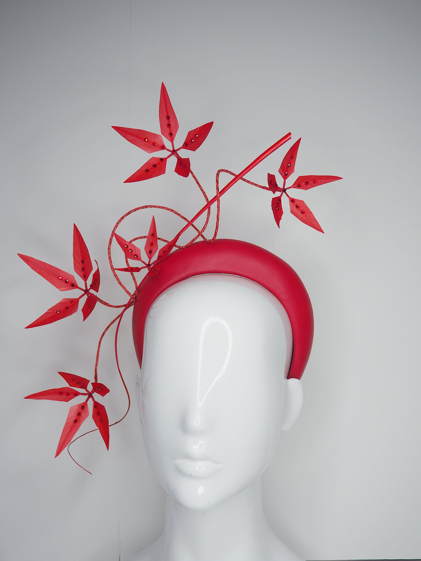 Razzamatazz - Red leather 3d headband with spiky Feather flowers and diamanté detail