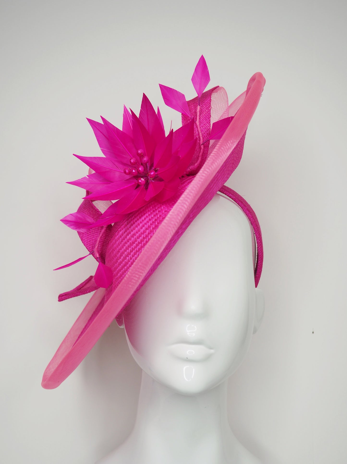 Big and Bright - Shocking pink buntal straw curved Saucer brim with Feather flower and crinoline edge