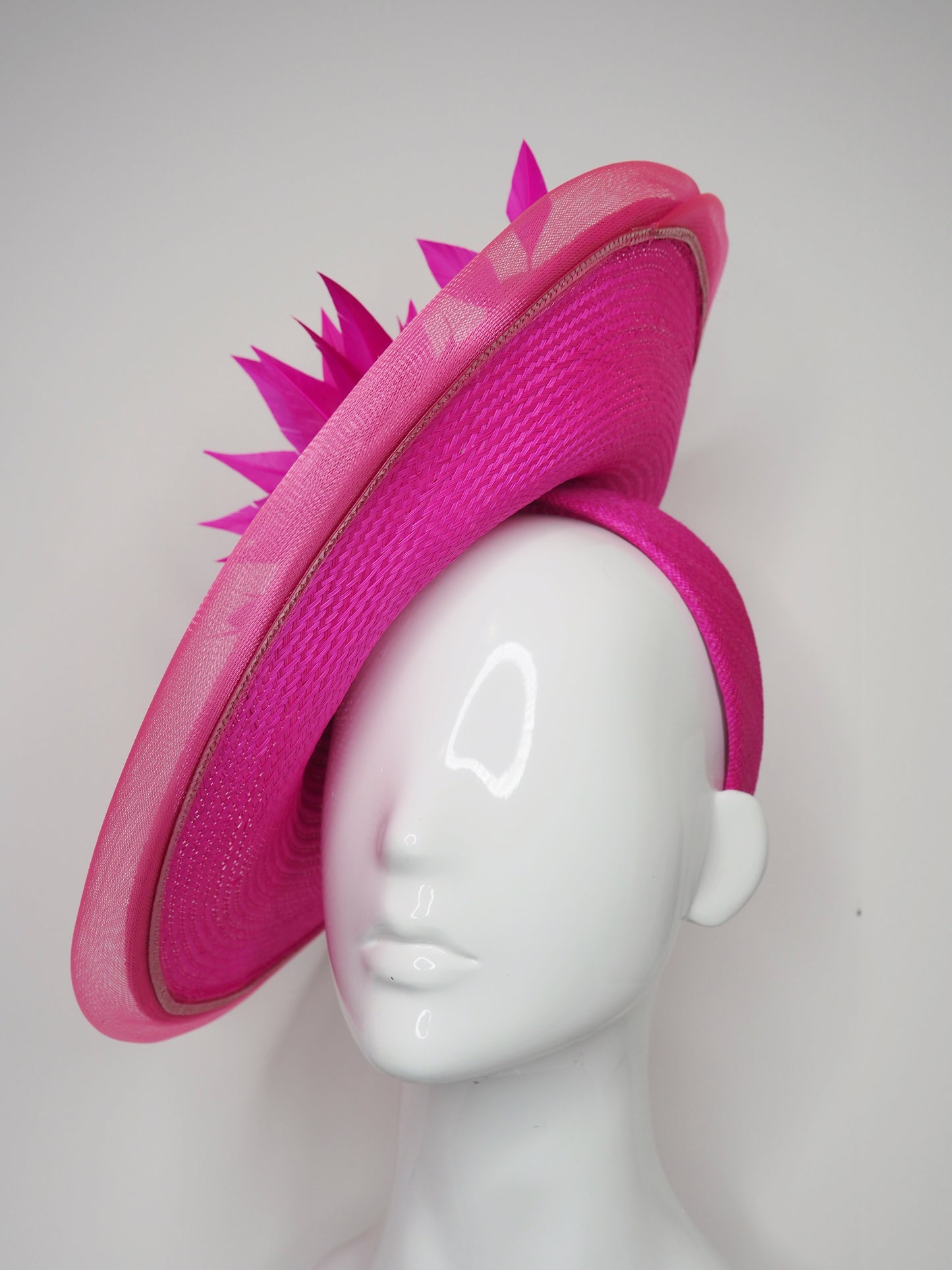 Big and Bright - Shocking pink buntal straw curved Saucer brim with Feather flower and crinoline edge